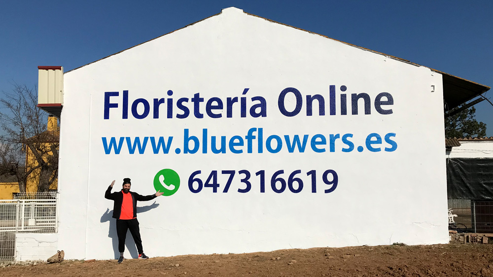 rotulación-a-mano-con-pintura-en-nave-industrial