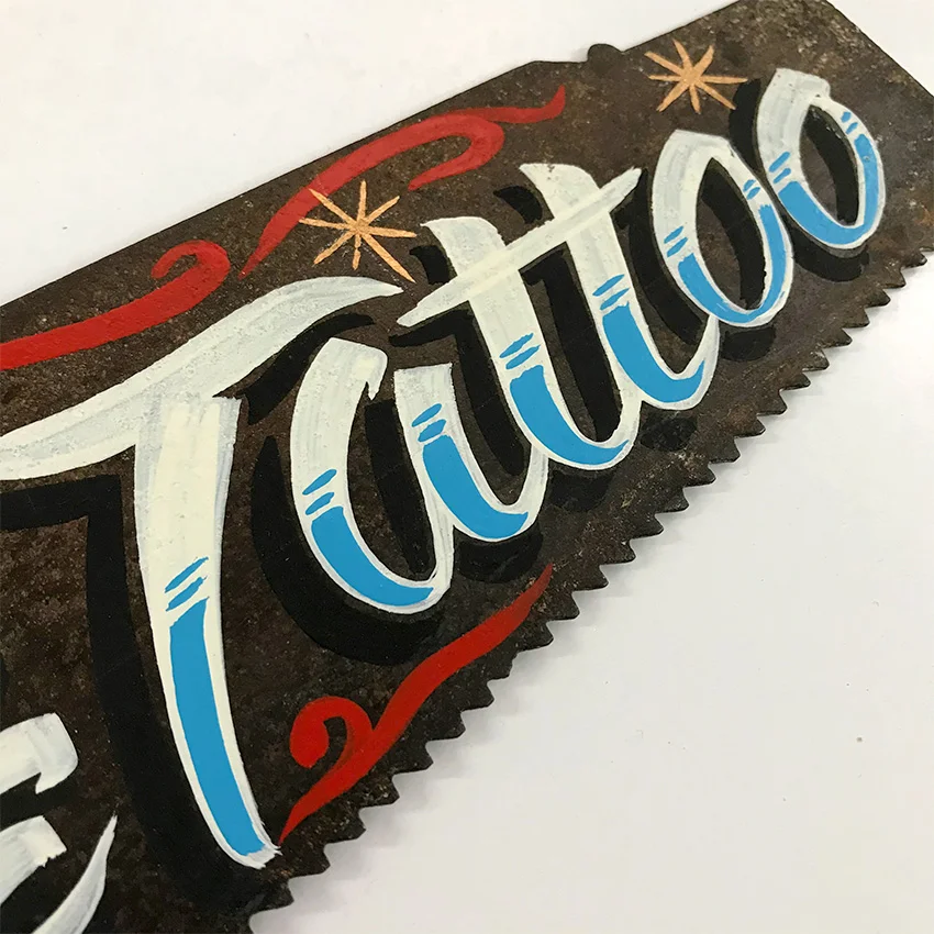 serrucho-tattoo-clean-hand-lettering-sign-painting